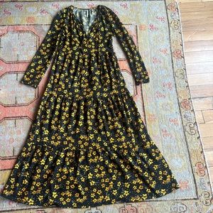 Free People Black dress with yellow flowers. Size small.